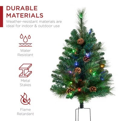 Best Choice Products Set of 2 24.5in Outdoor Scotch Pine Pathway Christmas Trees Decor w/ LED Lights, Pine Cones -E3-1660